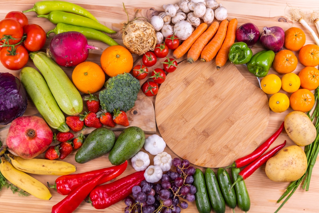 Colorful spread of berries, avocado, and vegetables