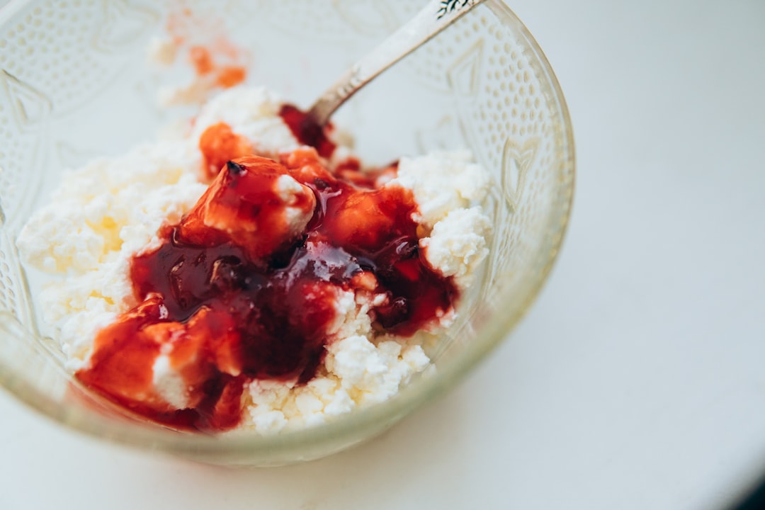 Bowl of cottage cheese topped with fruit