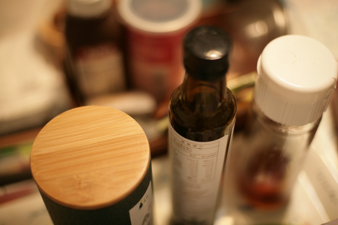 Supplement bottles on a kitchen counter